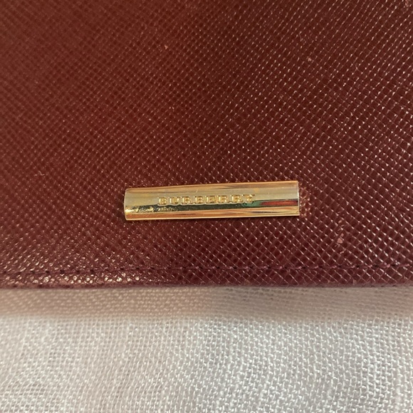 Burberry bifold leather wallet with some fabric plaid inside in GUC - Picture 2 of 14